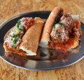 Meatball sub served in a Vietnamese bread roll.