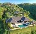 The resort sits on a hillside at the southern end of Jimbaran Bay.