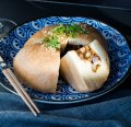 The giant pork bun, stuffed with a chunky mix of belly pork, chestnuts and mustard greens.