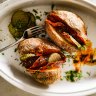 Baked potatoes with Bloody Mary butter, pickles and bacon.