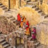 Women gathering water from a stepwell in Amer, near Jaipur,