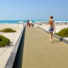 Enjoying the sea, sand and sun on Saadiyat Island in Abu Dhabi. Western beachwear is standard.