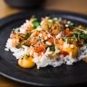 Sushi or taco? Chirashizushi is served with nori sheets to DIY.