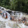 Escorted groups climb the Dunn's River Falls in Jamaica. 