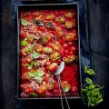 Kale gnocchi with balsamic tomatoes.