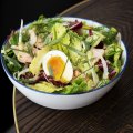 Slow-cooked salmon baby gem soft-boiled egg salad. 