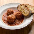Nonna's meatballs are served with or without pasta.