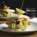 Crumbed fish sandwich with tartare and iceberg.