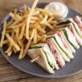 Good Food. Club sandwich with fries served at The Cosmopolitan in Double Bay, Sydney on February 26, 2020. Photo: Dominic Lorrimer