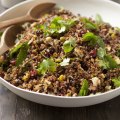 Quinoa and red rice salad with spicy cauliflower and black lentils.