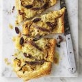 Andrew McConnell's anchovy, onion and olive tart.