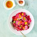Back to the roots bowl with baby beetroot, millet and chilli herb dressing.