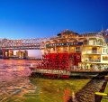 American Queen is a beautiful boat (never call these vessels "ships"), all white, six decks high, with staterooms opening onto wrap-around verandahs.