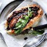 The secret is to cook the snag in sauce: Adam Liaw's perfect barbecued sausage in a bun.