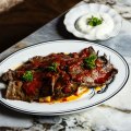 Go-to dish: Iskender - shaved lamb backstrap with capsicum sauce, pide bits and yoghurt.