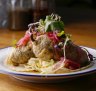 The fish tacos feature beer-battered swordfish-stuffed jalapenos.