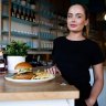 Bennelong chef de partie Anna Moretti, has set up a pop-up burger bar at Bondi Liquor Co. while unable to work due to Sydney's lockdown restrictions. 