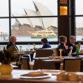 The dining room backdropped by the Sydney Opera House.