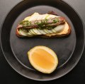 Toast with the most: Anchovy toast loaded with egg slices, salsa verde and mayonnaise.
