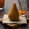 Coxinha stuffed with cream cheese and chicken.