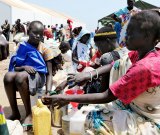 Internally displaced South Sudanese at a United Nations food distribution centre in Mingkaman. The centre provides food for more than 90,000 people who fled fighting in the nearby city of Bor.