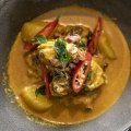 Cooking chicken curry from scratch during a class at The Fullerton Bay Hotel.