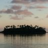 Tropical island at sunset, Rarotonga Island, Cook Islands. 