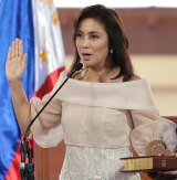 Leni Robredo is sworn in as Vice-President in June. She will keep that job - which is elected separately to the presidency - but quit her cabinet post.