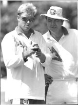 Warne discusses his grip with Australian coach Bob Simpson in1994. 