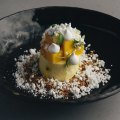 Mango mousse with coconut, passionfruit and white chocolate.