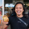 Khanh Ong with a banh mi from Tabac Bakery in Springvale.