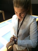 Belle Gibson trying out an Apple Watch prototype last year.