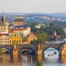  The Vltava River bridges shine in the setting sun.