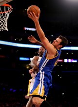 Scoring: Andrew Bogut drives to the basket during the win over the Lakers.