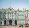 St. Petersburg, Russia - August 8, 2014: Tourists walking on the Palace square near Hermitage museum satfeb15sixbest