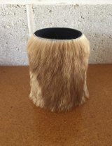A catskin stubby holder made by Barry Green. 