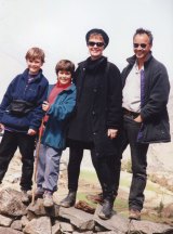Jack and Jesse Cox, with their parents Louise Cox and Mark Piddington, walking in Nepal in 1996.