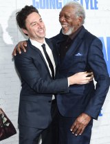 Director Zach Braff, left, greets actor Morgan Freeman attend the world premiere of <i>Going in Style</i> at the SVA Theatre in New York.