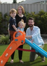 Scott and Michelle Robertson in Wagga Wagga with their kids Lila, 1, and Charlie, 3.