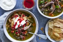 Spring lamb and lentil soup served with toasted mountain bread, yoghurt and sriracha.