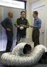 George Gregan chats home ventilation with Ventis Fyshwick owner Andrew Towndrow (centre) and MLA Shane Rattenbury.