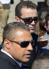 Al-Jazeera journalists Mohamed Fahmy (left) and Baher Mohamed outside Tora prison on Thursday, when the case against them was unexpectedly adjourned.  