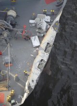 The container ship ACX Crystal suffered minor damage.