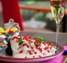 Chiles en nogada, a traditional festive dish, served at Azul's three restaurants in Mexico City, Mexico. The dish consists of poblano peppers, stuffed with fruits and meats, covered in walnut cream sauce and pomegranate seeds. It is eaten in Mexico between August and early September only. 