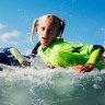 10-year-old surfing triplets travel from US to Sydney