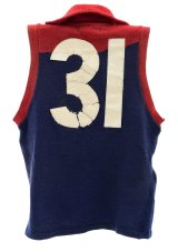 Ron Barassi's famous No. 31 Melbourne jumper from the 1964 season, in match-worn condition. Estimate: $20,000 to $40,000.