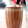 A double chocolate and peanut butter shake made from white milk