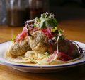 The fish tacos feature beer-battered swordfish-stuffed jalapenos.