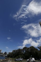 Three artists used skywriters to get the "Shut down Manus" message across.