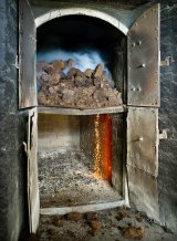 Peat in a kiln creates heat and smoke that gives the barley its distinctive, polarising flavour.